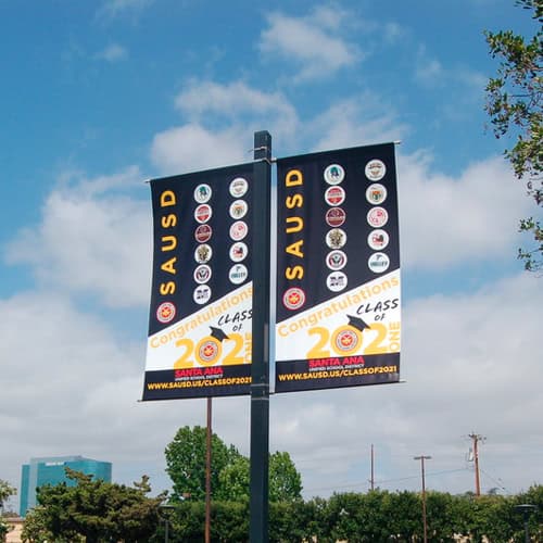 Hanging pole banners at a high school