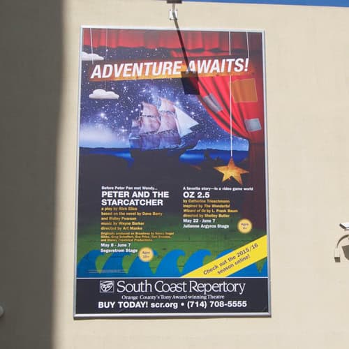 snap frame banner on the side of a building