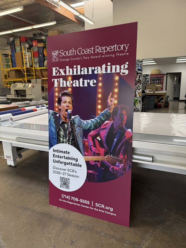 wrap around display board leaning against a table