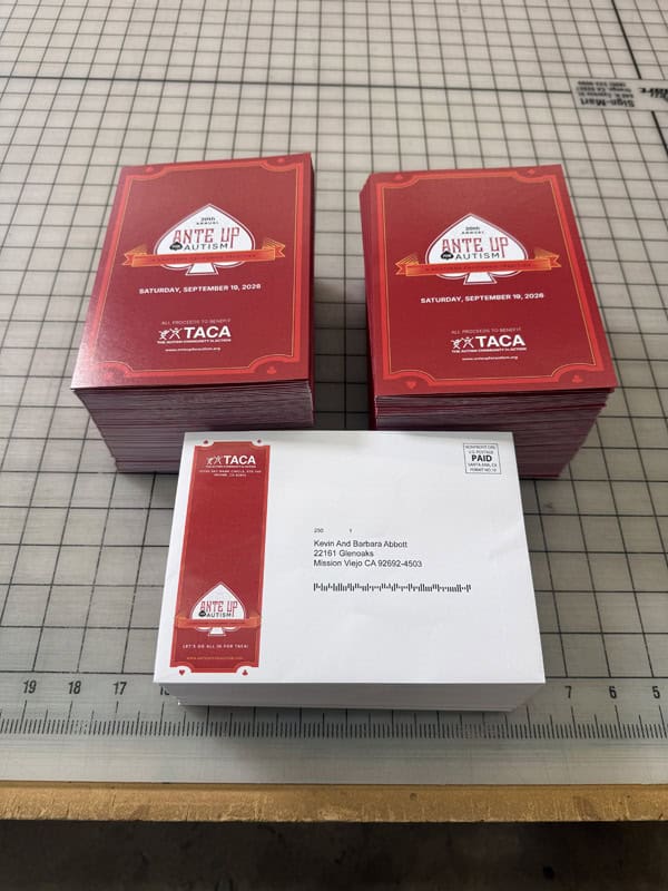 cards and envelopes stacked on a table
