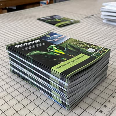 A stack of booklets on a table