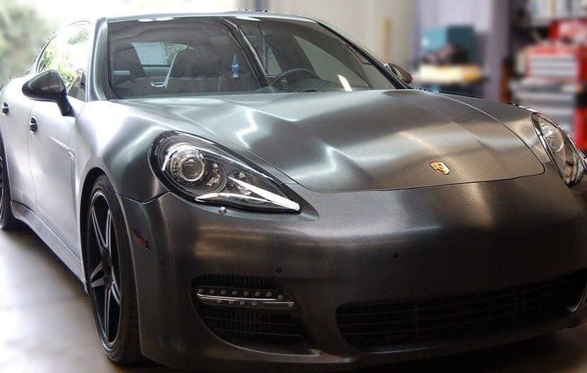 a Porsche wrapped in brushed metal