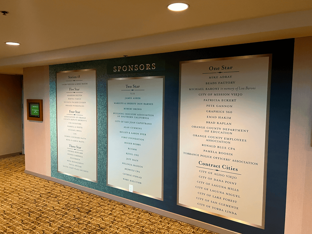 A wall graphic has been installed on a hotel wall for an event
